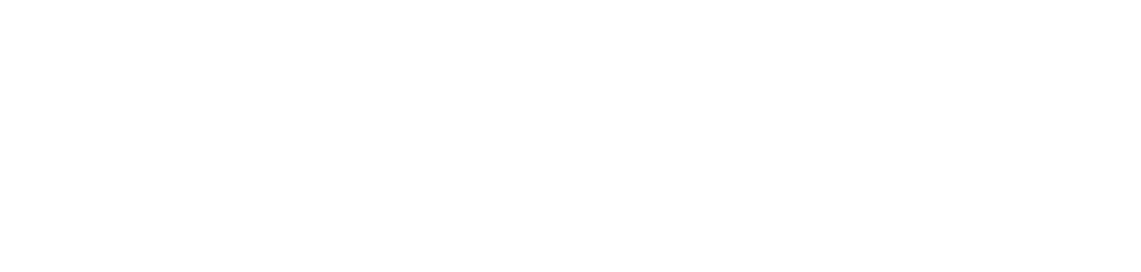 Person holder en hvid kop kaffe